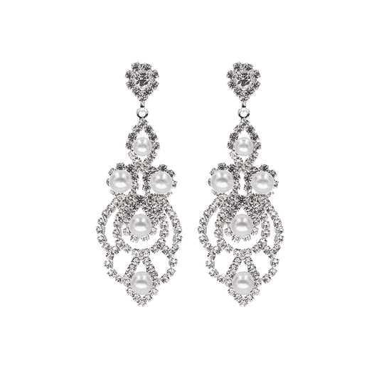 Pearl power earrings